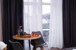 Квартира Apart Sol Polyana Resort. Апартаменты двухместный с балконом 1