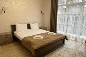 Отель Gold Palace Wellness & Spa. Стандарт 4-местный панорамный двухкомнатный 1
