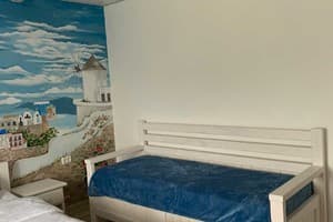 Бутик-отель PogarInn. Стандарт трехместный Санторини с видом на горы 4