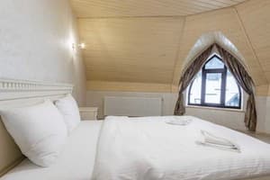 Отель Premium hotel & SPA. Люкс 4-местный мансардный 1